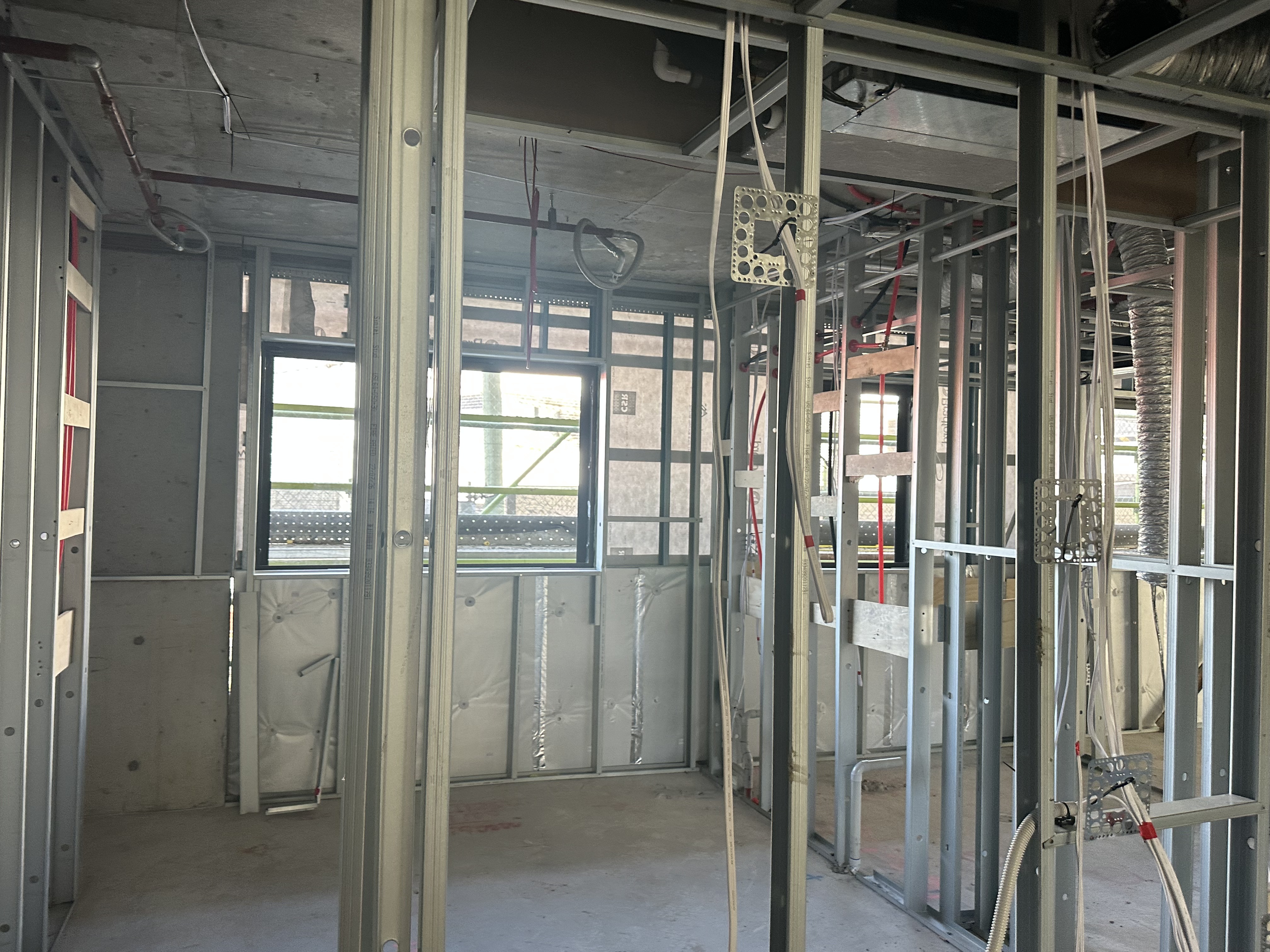 Wall framing and services before wall linings are installed